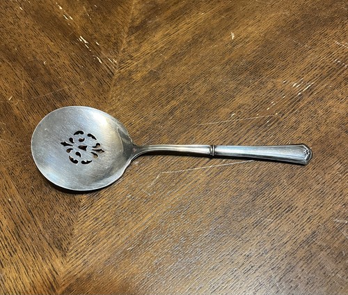Pomodoro traforato con - , manico